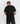 Back view of the Ariiston 'Aussie Cotton Classic Luxe' Black T-Shirt worn by a male model, featuring a simple, clean design ideal for casual outings