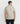 Back view of a model wearing the Ariiston Waffle T-shirt in Quiet Grey, highlighting the textured fabric and relaxed fit.