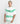Model wearing Ariiston Brush Stroke drop-shoulder t-shirt in white and green, made from 100% Super Combed Cotton.