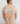 Back view of model in cameo rose 'Cheesy Delight' graphic t-shirt