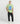Model wearing the foam green Ariiston 'Ambition' graphic t-shirt