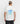 Back view of a model wearing the marshmallow white Ariiston 'Loop' graphic t-shirt