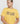Close-up of a model showing the fit of the rattan yellow 'Energy' t-shirt