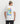 Back view of a model wearing the Ariiston 'New Imagination' T-Shirt
