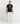 Full view of a model in the black Ariiston Signature HD Gel Print T-Shirt