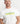 Detailed portrait of a model in the white Signature T-Shirt