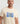 Close-up of a model wearing an Ariiston 'Khadi Mate' T-shirt, highlighting fabric details.